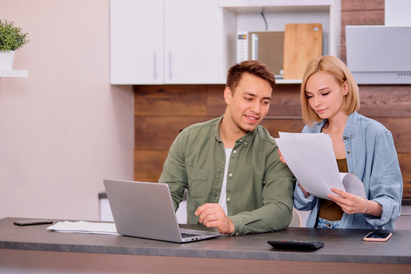 homeowner looking at heating bills