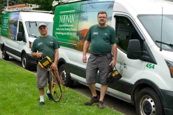 Noonan Energy HVAC techs and service van