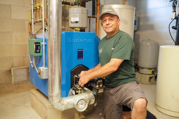 Noonan Energy technician performing boiler system service