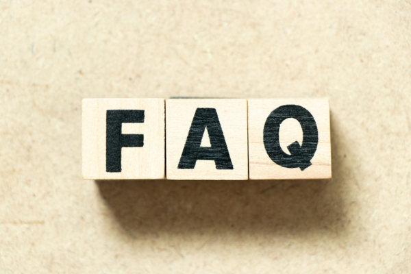 FAQ spelled using wooden letter cubes depicting questions about electrical upgrade