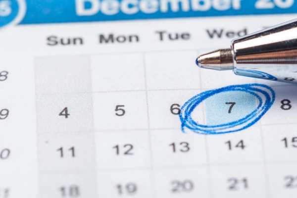 water heater maintenance schedule encircled on a calendar