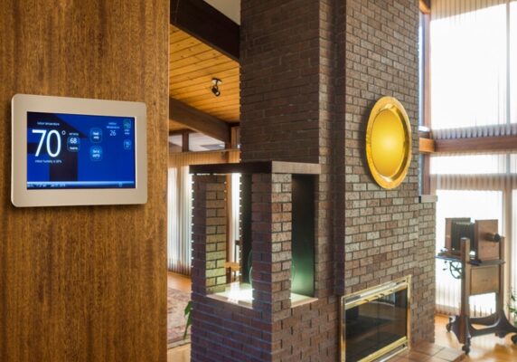 Programmable electronic thermostat installed at home